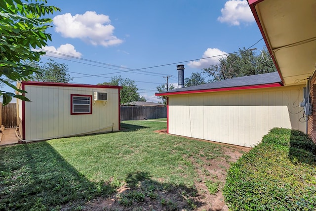 3404 W Michigan Ave, Midland, TX 79703 - view of yard with a wall mounted AC and an outbuilding
