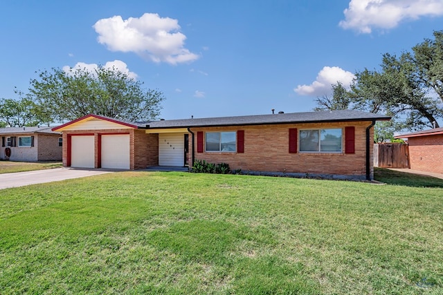 3404 W Michigan Ave, Midland, TX 79703 - ranch-style house with an attached garage, concrete driveway, and brick siding