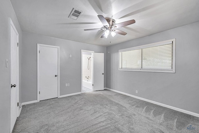 3404 W Michigan Ave, Midland, TX 79703 - unfurnished bedroom featuring carpet, baseboards, ensuite bath, and ceiling fan