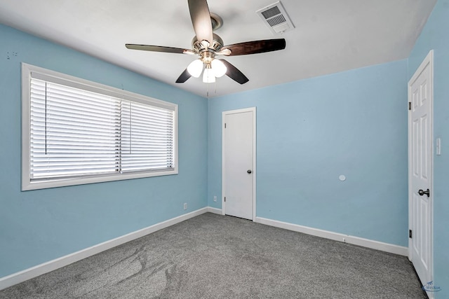 3404 W Michigan Ave, Midland, TX 79703 - unfurnished bedroom with carpet, baseboards, and ceiling fan