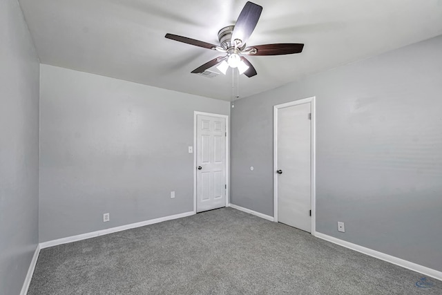 3404 W Michigan Ave, Midland, TX 79703 - unfurnished bedroom with carpet flooring, baseboards, and a ceiling fan