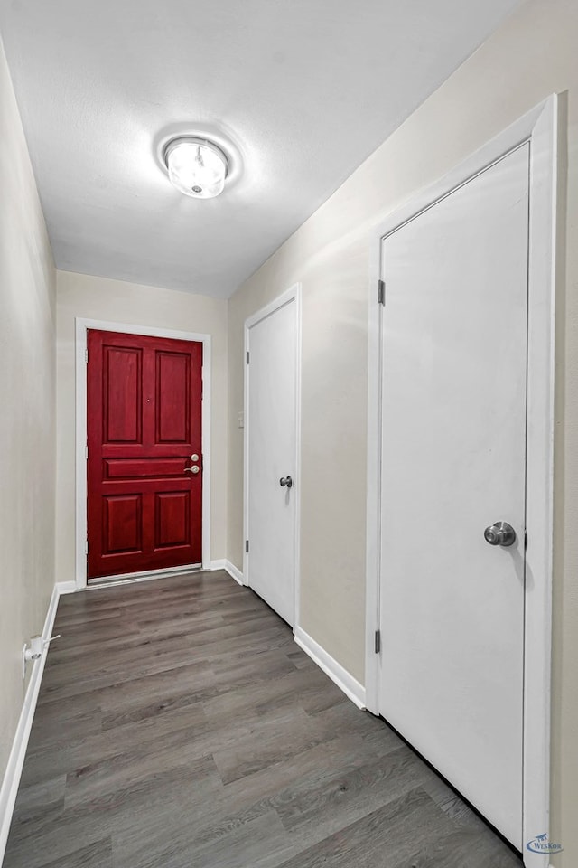 3404 W Michigan Ave, Midland, TX 79703 - doorway to outside featuring wood finished floors and baseboards