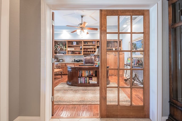 office space featuring french doors and ceiling fan