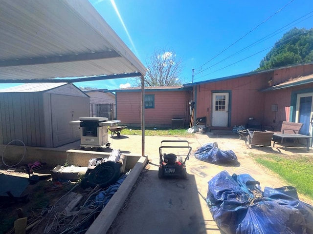 1603 5th St, Big Spring, TX 79720 - view of patio / terrace with a storage shed