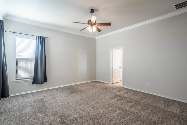 carpeted empty room featuring ceiling fan and ornamental molding