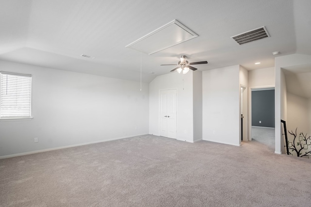 1212 Santa Clara, Midland, TX 79705 - spare room with attic access, carpet, vaulted ceiling, a smoke detector, and ceiling fan