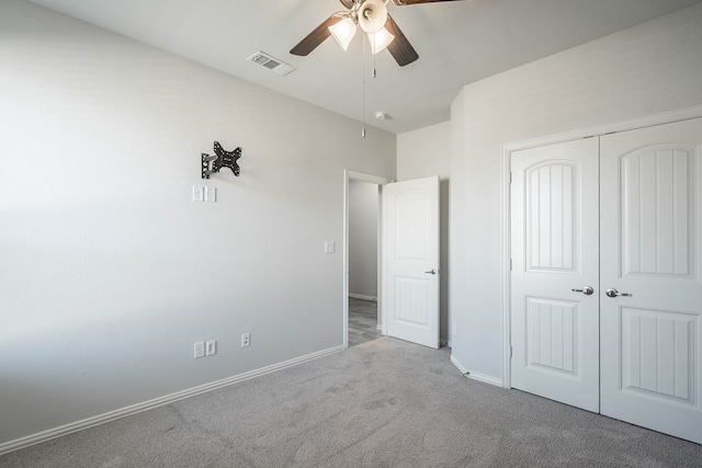 1212 Santa Clara, Midland, TX 79705 - unfurnished bedroom featuring carpet, a closet, and a ceiling fan