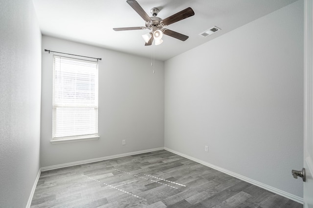 1212 Santa Clara, Midland, TX 79705 - empty room with a ceiling fan and wood finished floors