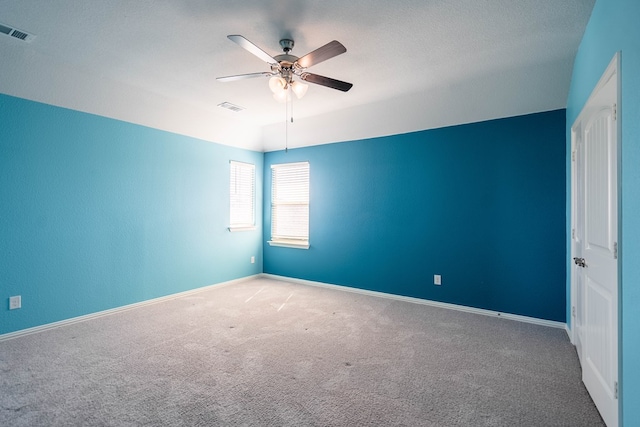 1212 Santa Clara, Midland, TX 79705 - spare room featuring ceiling fan and carpet