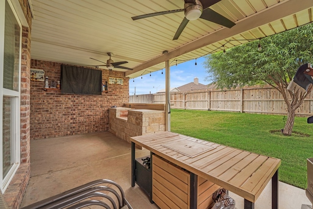 9910 Aloe Ct, Odessa, TX 79765 - fenced backyard with a ceiling fan, area for grilling, and a patio