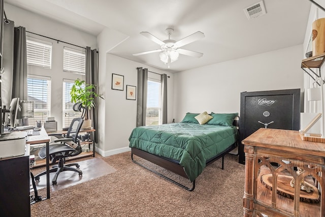 9910 Aloe Ct, Odessa, TX 79765 - bedroom with an office area, carpet floors, and a ceiling fan