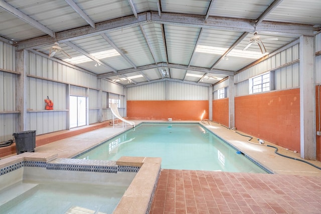 view of pool featuring a water slide and ceiling fan