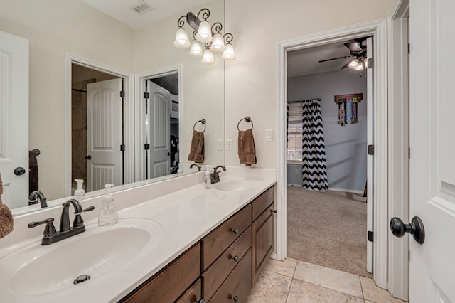 full bathroom with a ceiling fan, visible vents, a sink, and double vanity