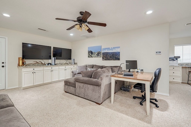 living area featuring recessed lighting, visible vents, light carpet, and ceiling fan