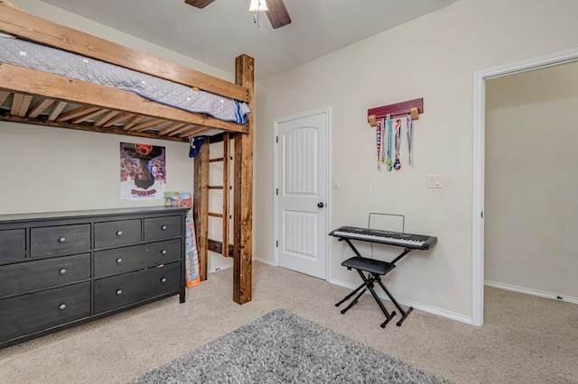bedroom with baseboards, carpet, and ceiling fan