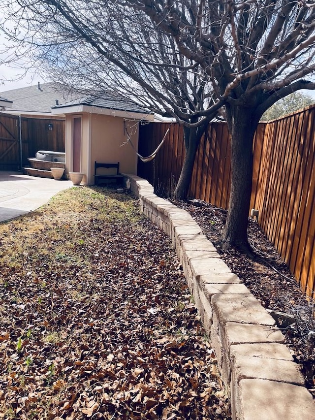 view of yard featuring a fenced backyard