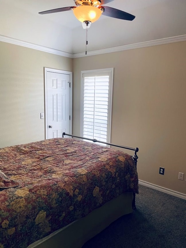 bedroom featuring ornamental molding, ceiling fan, carpet floors, and baseboards