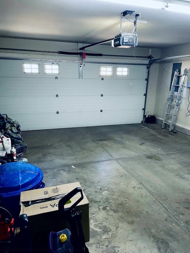 garage featuring a garage door opener