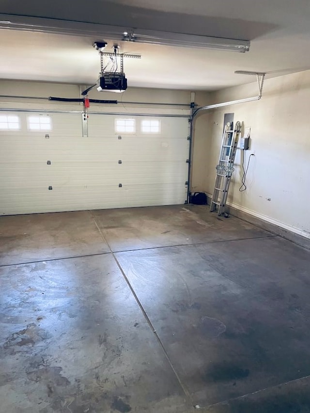 garage featuring a garage door opener