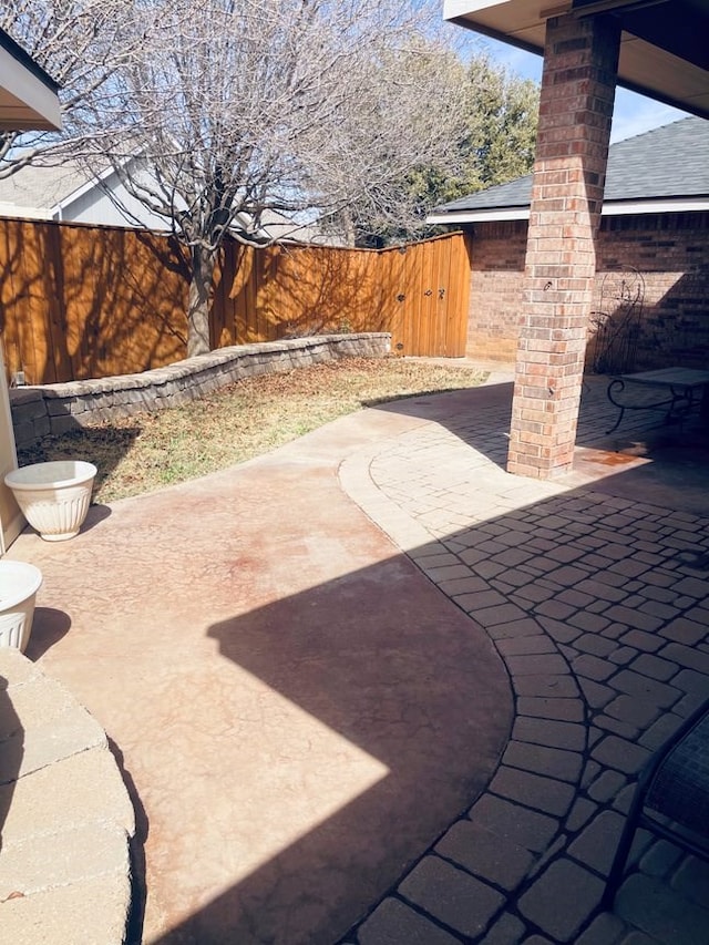 view of patio with fence