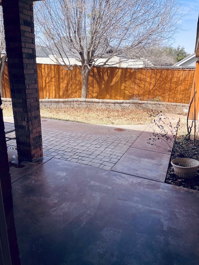 view of patio featuring a fenced backyard