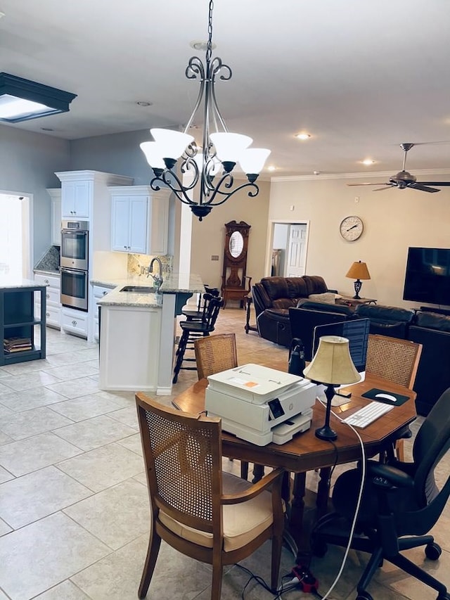 dining space featuring ceiling fan with notable chandelier, light tile patterned flooring, and recessed lighting