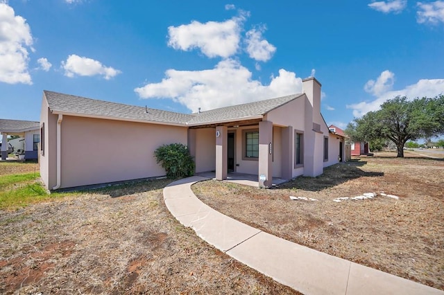 1901 College Ave, Midland, TX 79701 - single story home featuring stucco siding and a chimney
