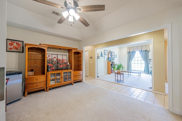 2807 Ann Dr, Midland, TX 79705 - living area with carpet flooring, tile patterned flooring, ceiling fan, and baseboards