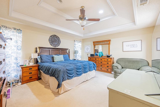 2807 Ann Dr, Midland, TX 79705 - bedroom featuring a tray ceiling, light colored carpet, a ceiling fan, and crown molding