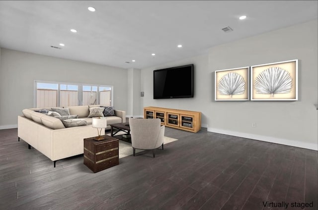 living room featuring dark wood-type flooring