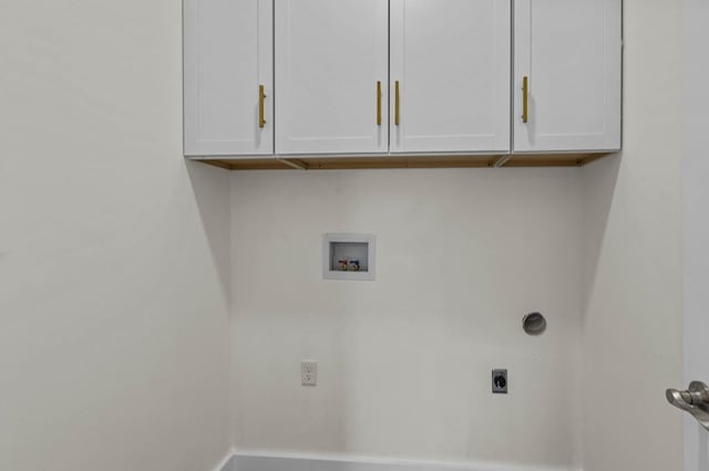 laundry area featuring washer hookup, electric dryer hookup, and cabinets