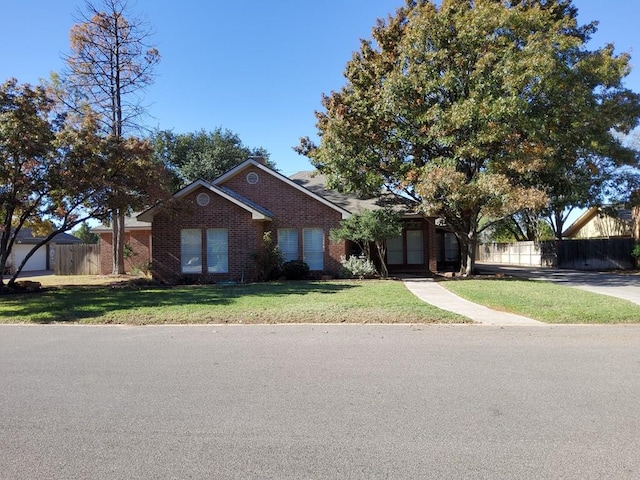 view of front facade with a front yard