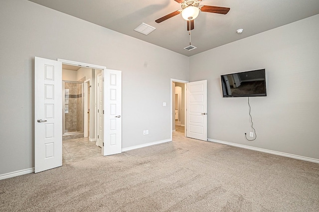 unfurnished bedroom with ceiling fan and light carpet