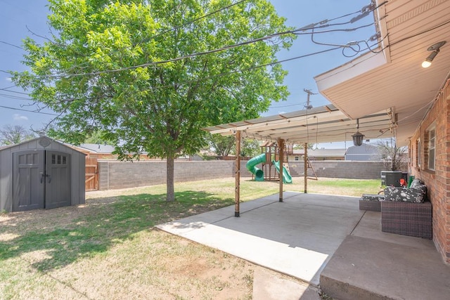 702 Dellwood St, Midland, TX 79701 - view of yard featuring a playground, a patio, and central AC