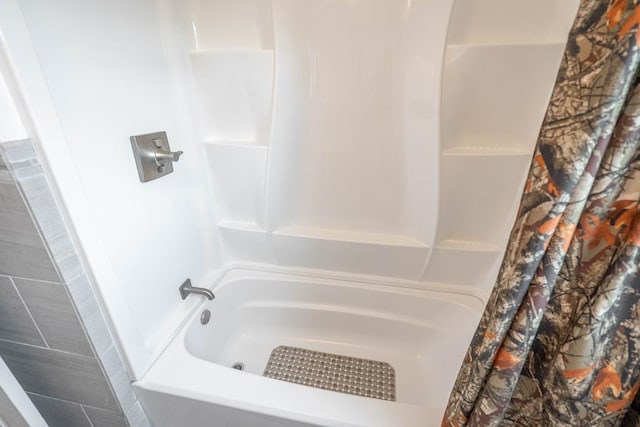 702 Dellwood St, Midland, TX 79701 - bathroom with shower / tub combo