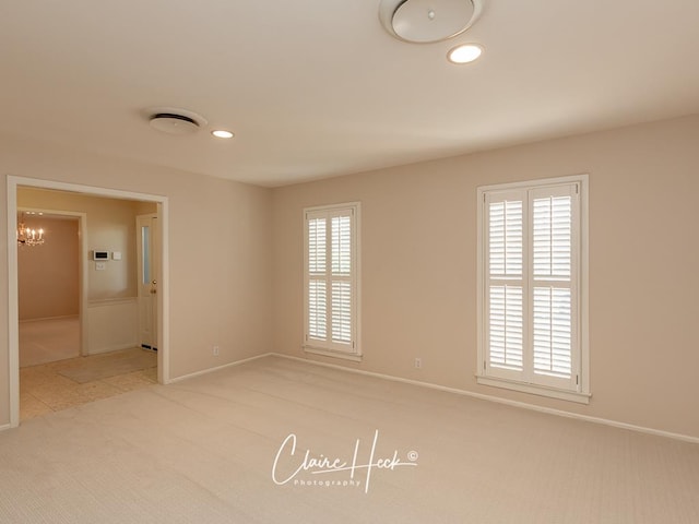 3307 Stanolind Ct, Midland, TX 79707 - spare room featuring carpet flooring, a chandelier, and recessed lighting