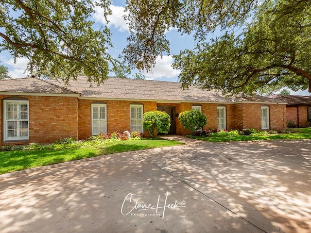 3307 Stanolind Ct, Midland, TX 79707 - single story home featuring brick siding