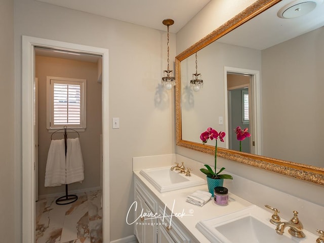 3307 Stanolind Ct, Midland, TX 79707 - full bath featuring marble look tiles and double vanity