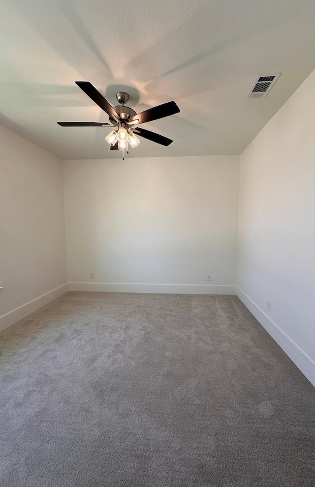 unfurnished room with carpet floors and ceiling fan