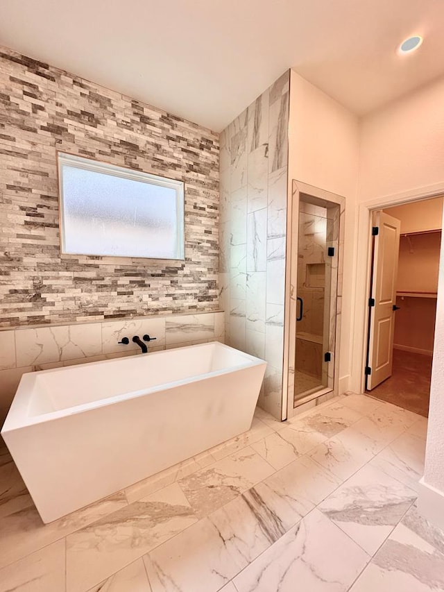 bathroom featuring plus walk in shower