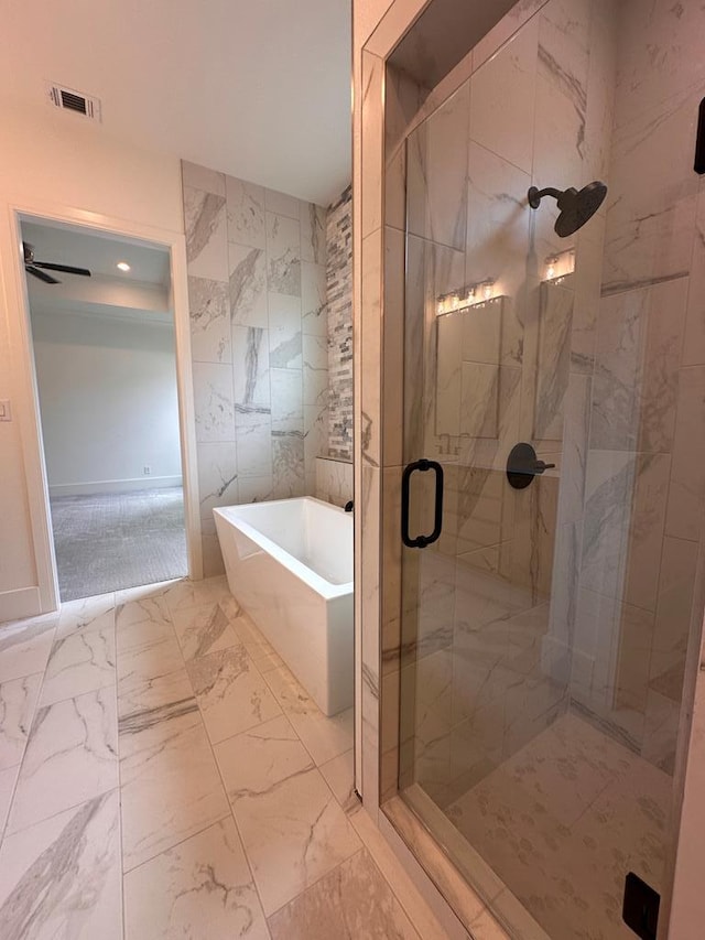 bathroom with ceiling fan and independent shower and bath