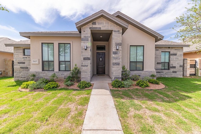 view of front of home with a front yard