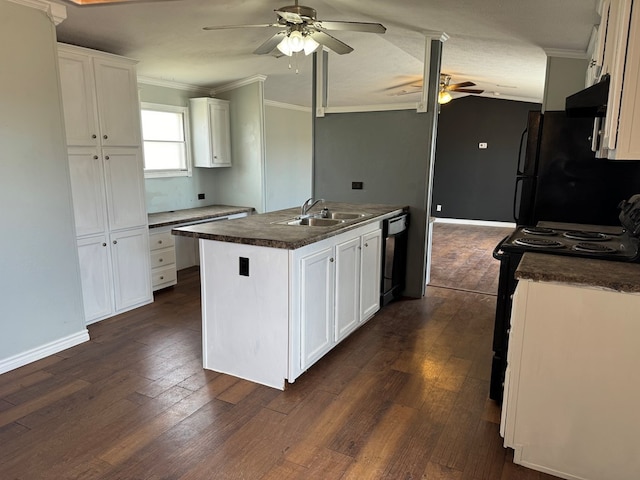 kitchen with dark countertops, ornamental molding, a sink, black appliances, and extractor fan