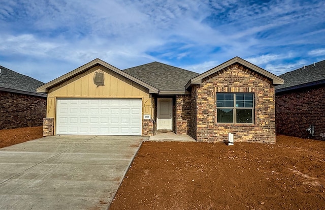 view of front of property featuring a garage