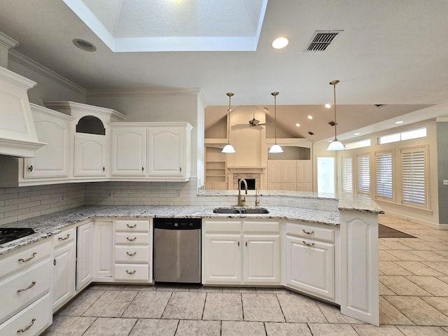 kitchen with sink, backsplash, white cabinets, and dishwasher