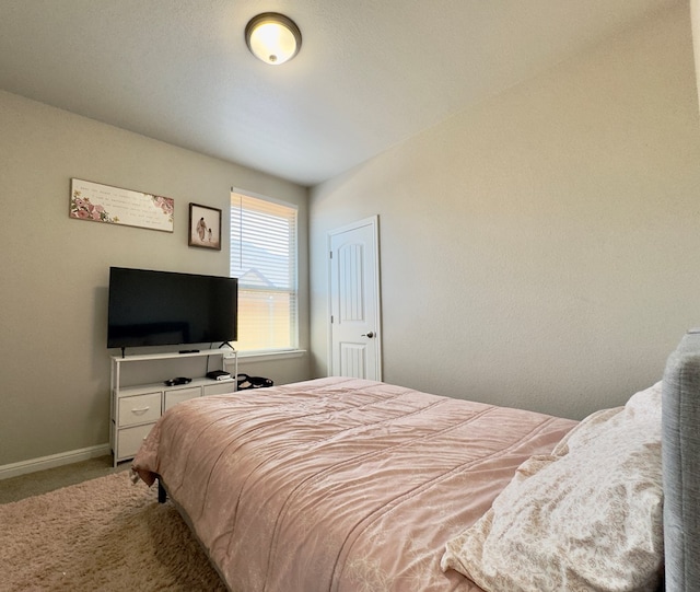6005 Scaled Quail Rd, Midland, TX 79707 - bedroom featuring light colored carpet and baseboards