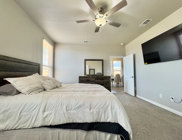 6005 Scaled Quail Rd, Midland, TX 79707 - bedroom featuring carpet flooring, baseboards, and ceiling fan