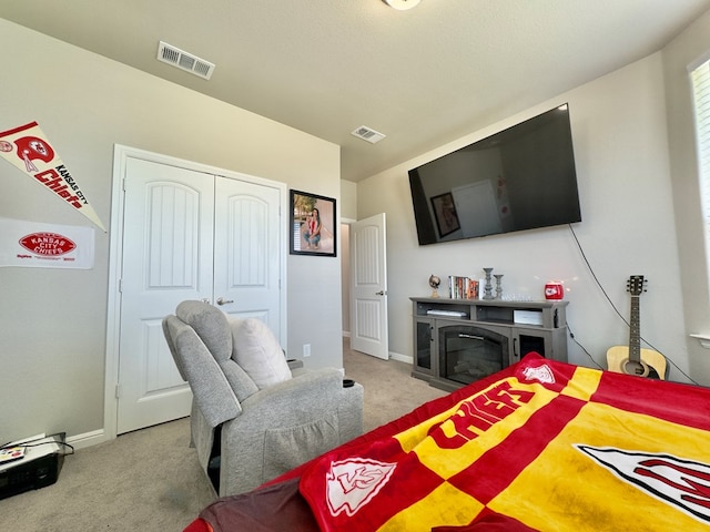 6005 Scaled Quail Rd, Midland, TX 79707 - carpeted bedroom with a closet and baseboards