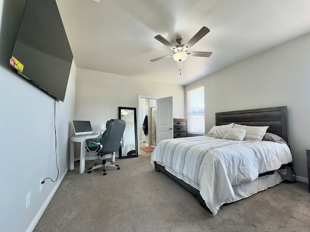 6005 Scaled Quail Rd, Midland, TX 79707 - bedroom featuring carpet floors, an office area, baseboards, and a ceiling fan