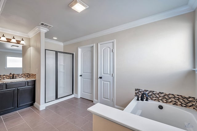 bathroom with separate shower and tub, crown molding, tile patterned floors, and vanity